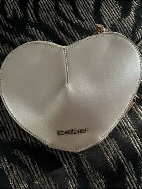 bebe Heart Mini Crossbody in Metallic Silver
